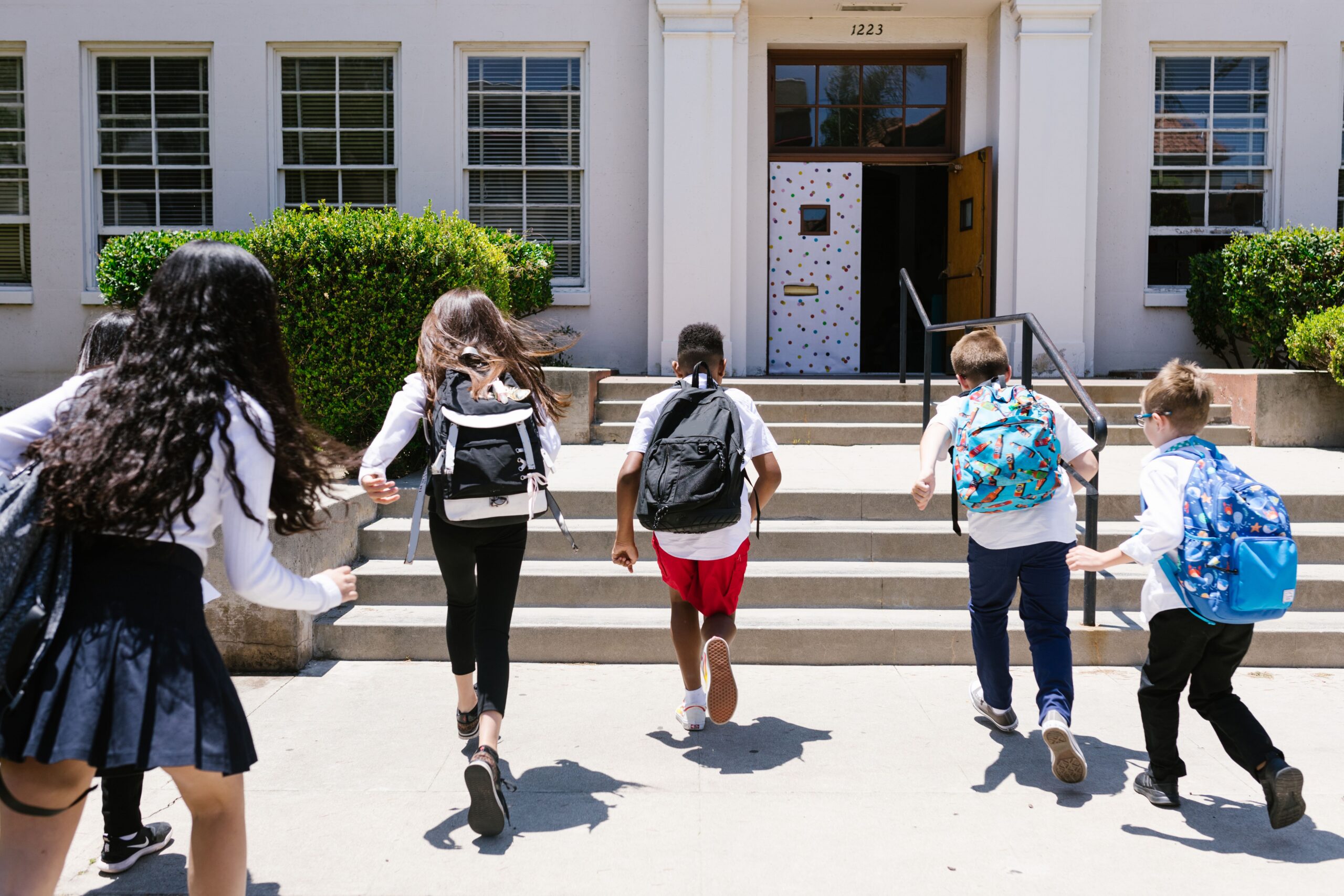 K12 kids running into school – k12 deferred maintenance article